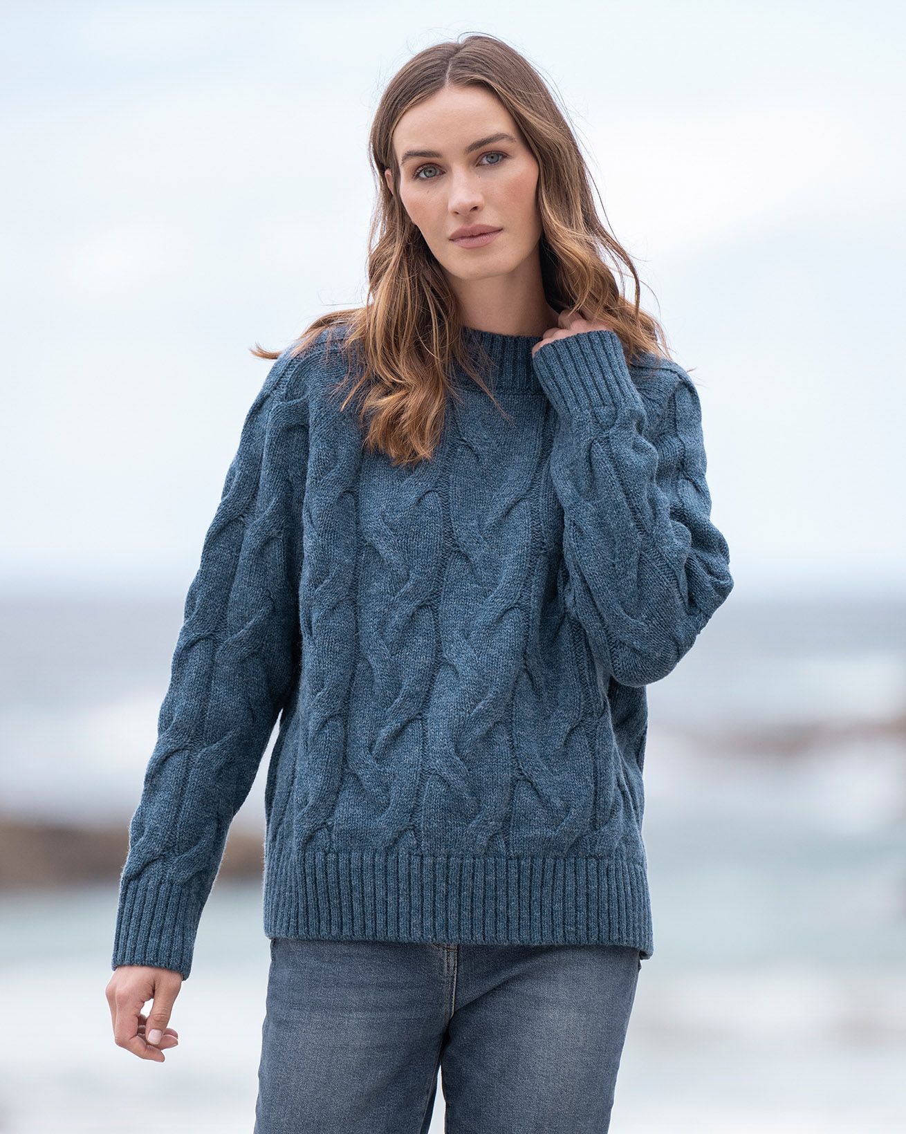 Cable knit mock neck sweater