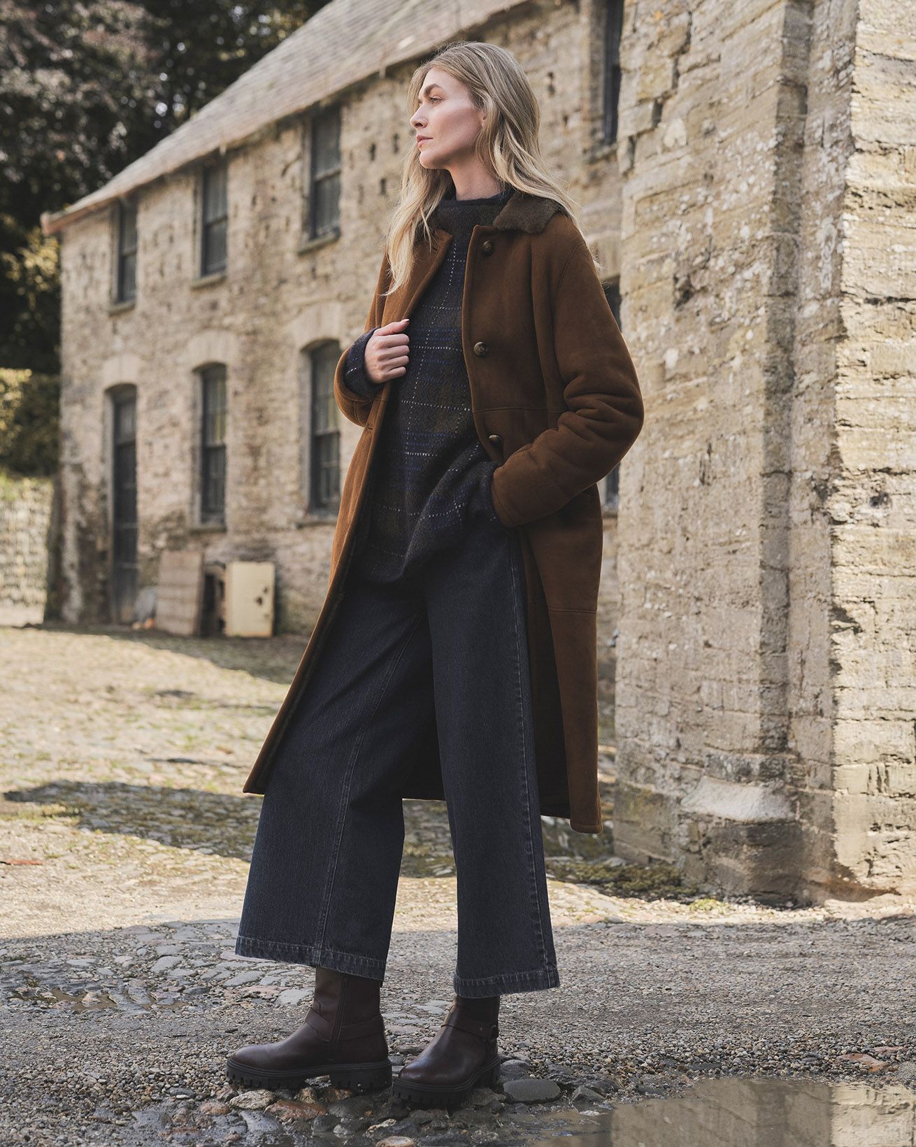 Manteau long à col en peau de mouton