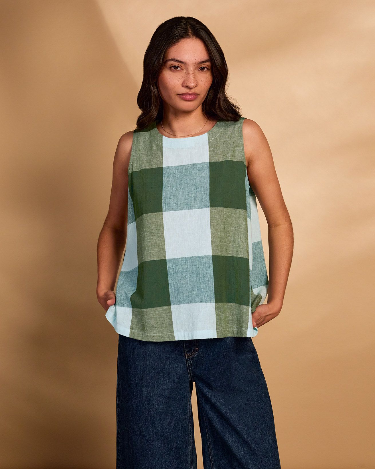 Sleeveless Pleat Back Swing Top